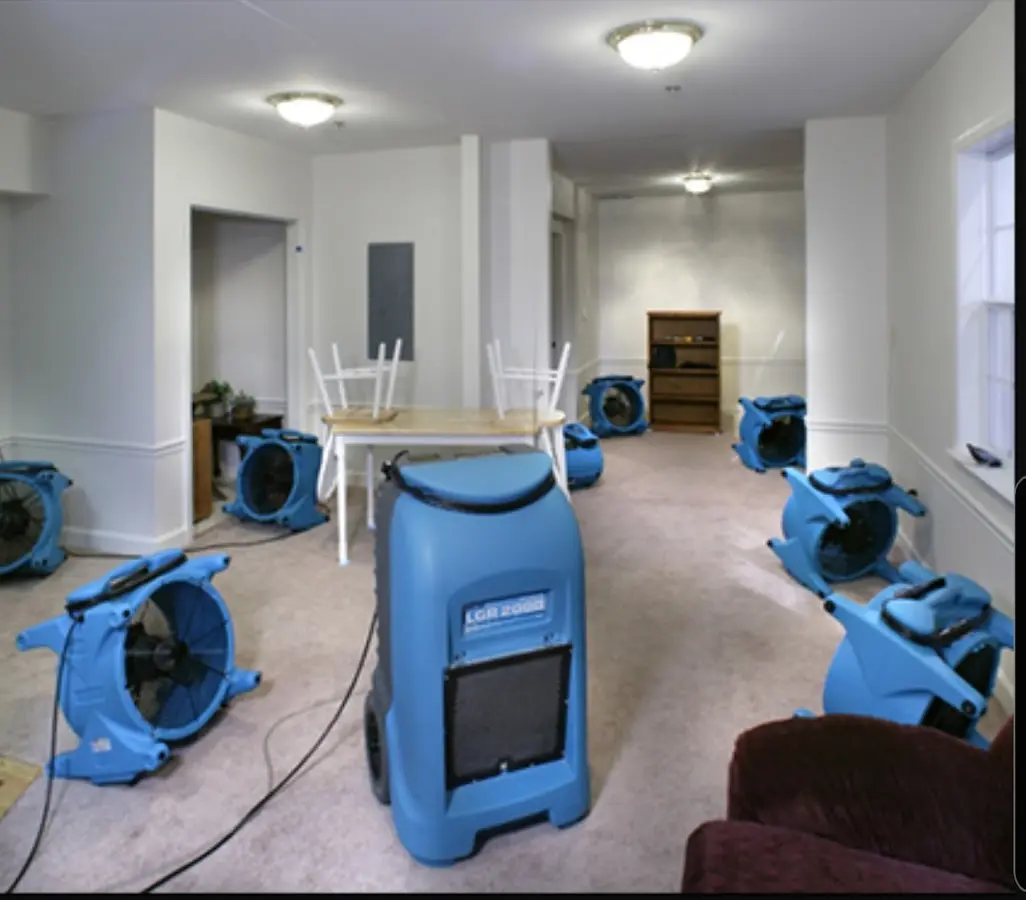 Air movers and dehumidifier setup for Water Damage Restoration in Weehawken